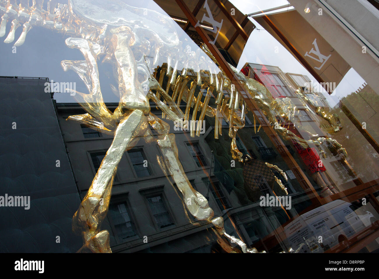 Dinosaur themed window display at Louis Vuitton`s flagship store in New